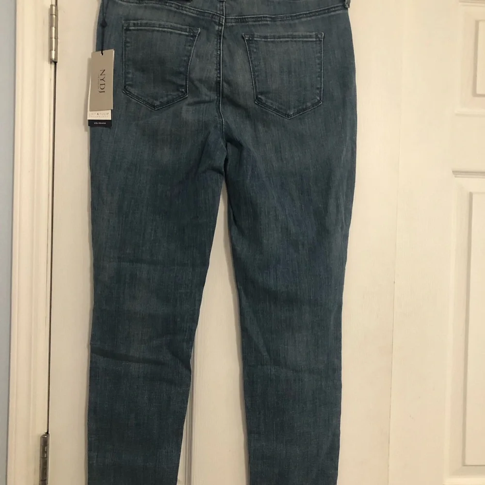 NYDJ new Skinny Legging Women's Jeans ripped knee size 10 lift tuck technology‎